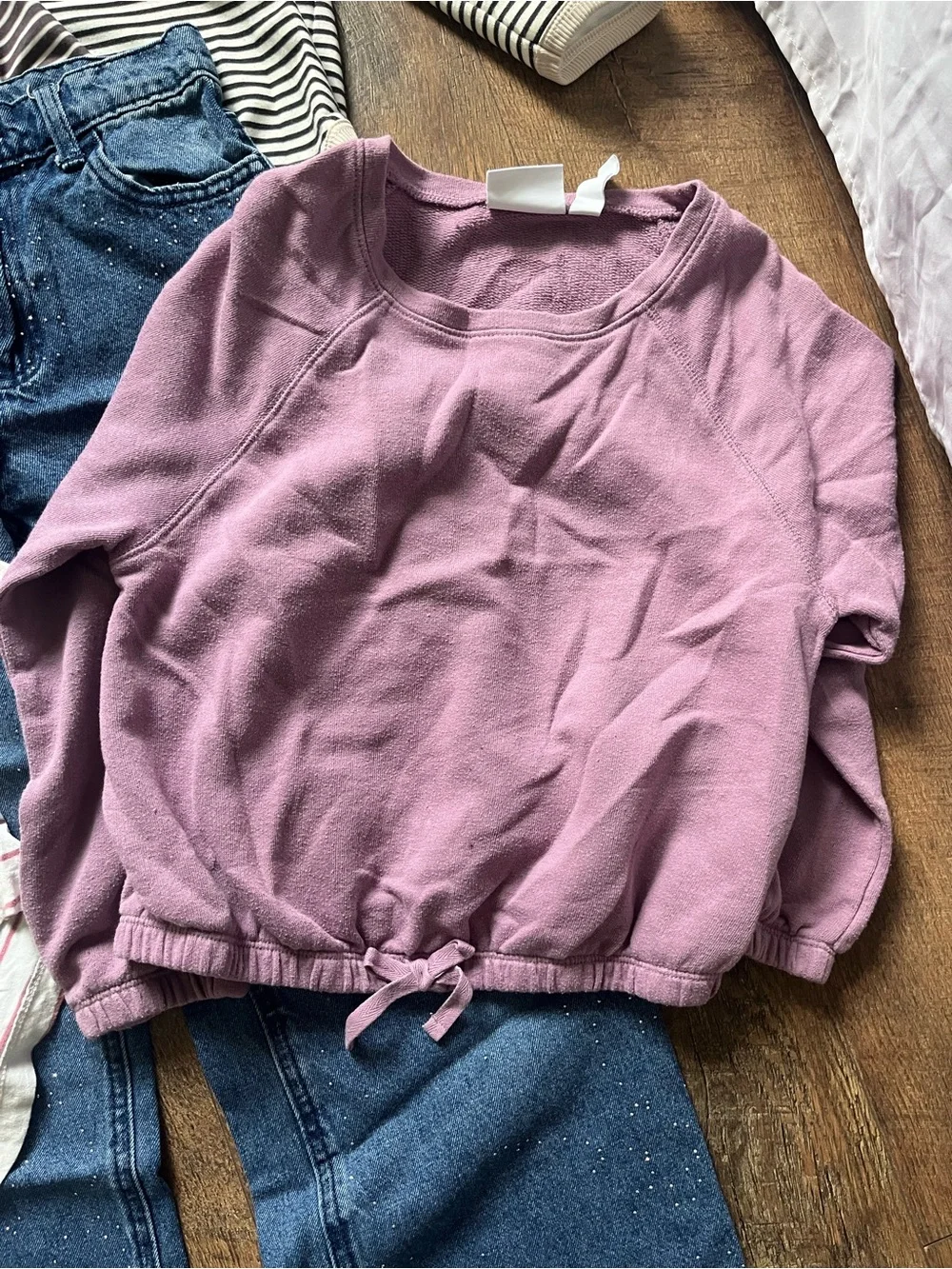 Bundle of girls long sleeve tops and jeans size 7/8